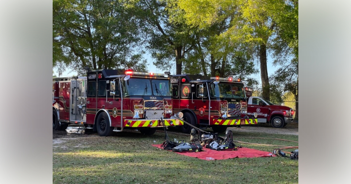 Ocala firefighters battle RV fire in business parking lot on March 16, 2023 - firefighters at scene
