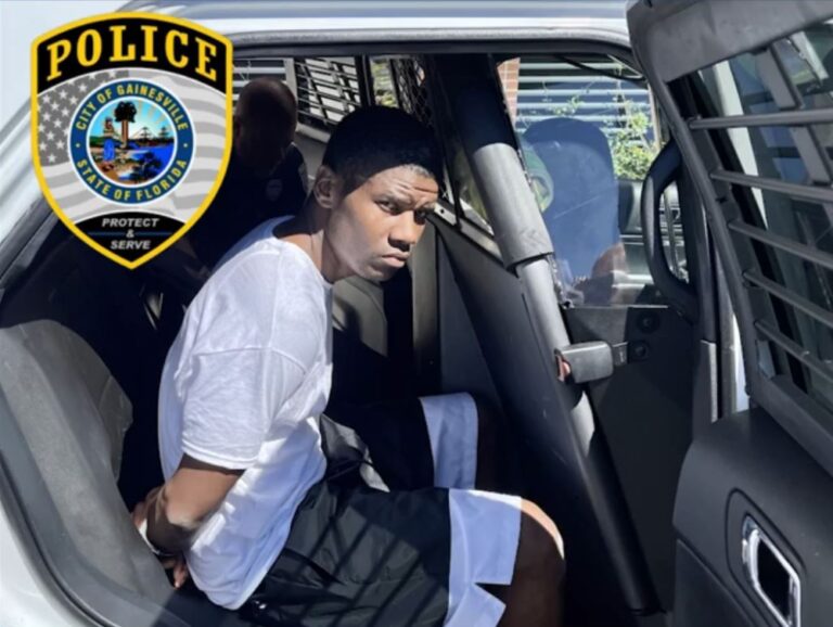 Timothy Wims detained Gainesville Police Department bank robbery suspect March 14 2023 suspect inside patrol car