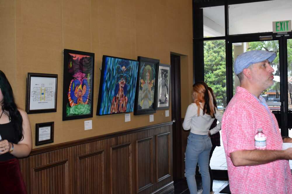 2023 Student and Emerging Artist Competition people browsing art (7)