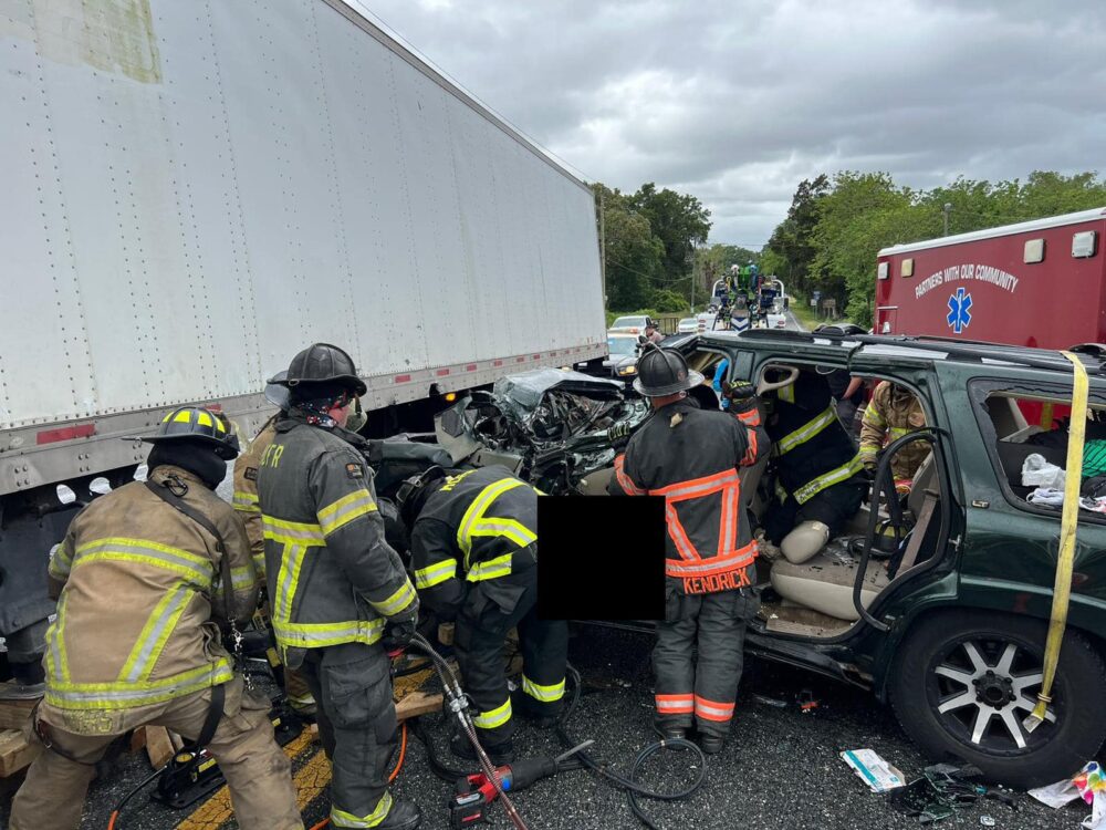 MCFR April 10 2023 SUV and semi crash firefighters extricating SUV driver 6 MCFR April 10 2023 SUV and semi crash firefighters extricating SUV driver 6