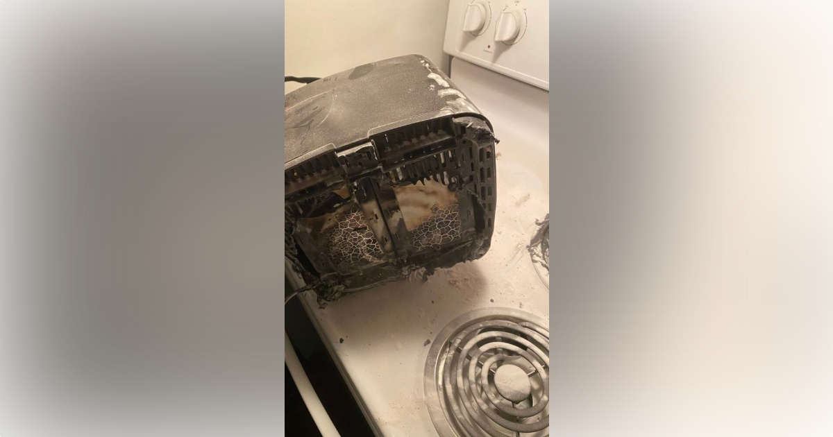 Toaster on stovetop catches fire in Ocala apartment on April 18, 2023 - photo of toaster and stovetop 