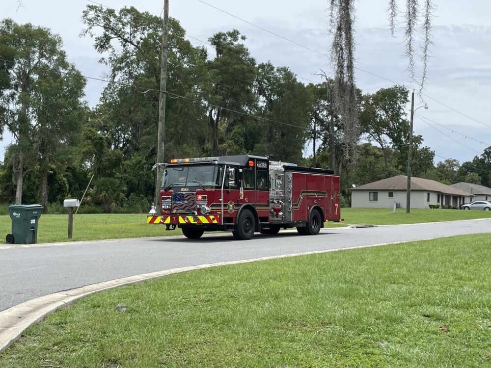 Ocala Fire Rescue responds to ground depression near SE 28th Place and SE Fifth Terrace (June 21, 2023) OFR firetruck at scene