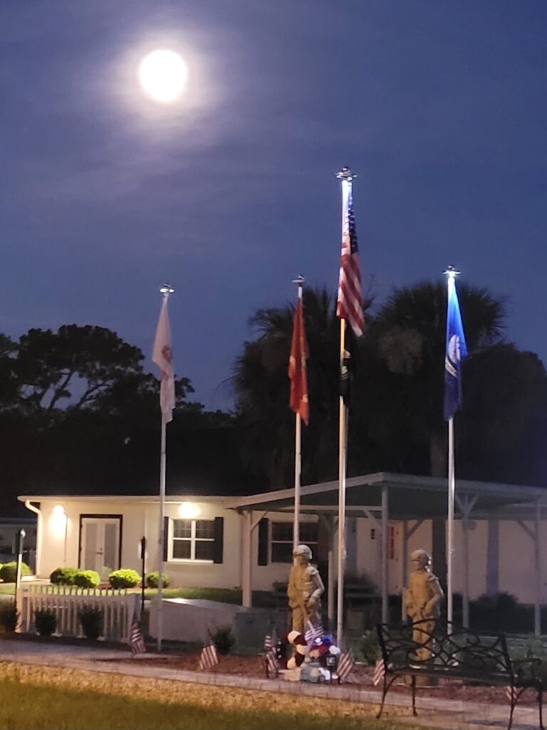 Moon over clubhouse and memorial in Sweetwater Oaks in Ocala