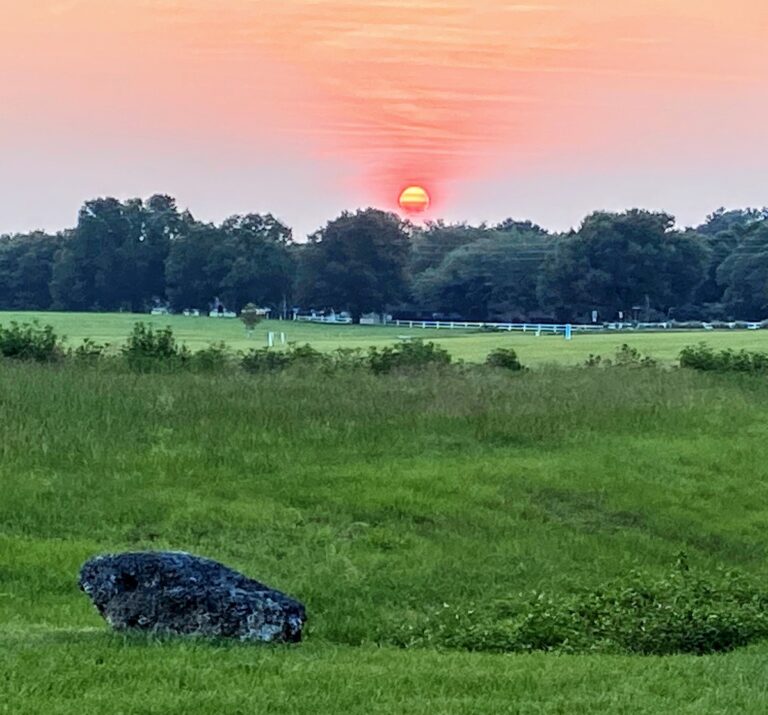 Smoldering sunset over On Top of the World Golf Club