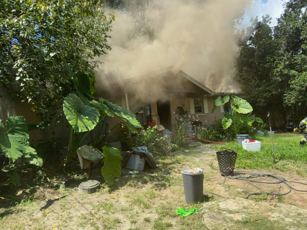 Marion County Fire Rescue and Ocala Fire Rescue respond to Ocala house fire on August 1, 2023 smoke rising from roof (2) (photo MCFR)