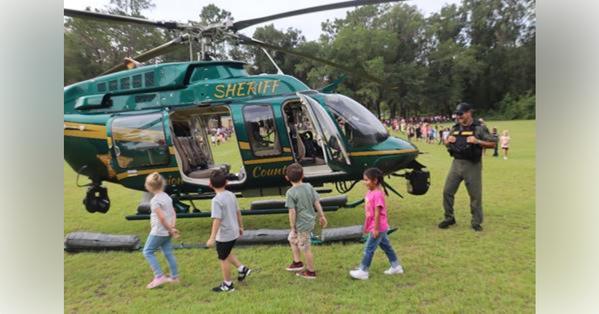 Sparr Elementary School students examine the Marion County Sheriff’s Office helicopter up close and personal this morning.