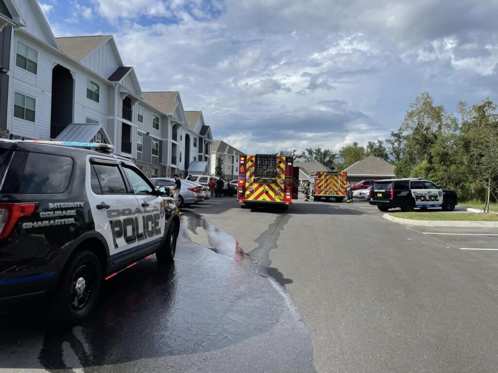 Ocala firefighters and police officers at the scene of an apartment fire (Photo: Ocala Fire Rescue)