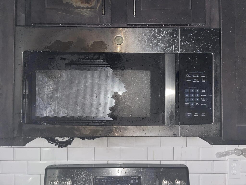 This microwave in a second-floor unit in Ocala sustained damage from a fire (Photo: Ocala Fire Rescue)