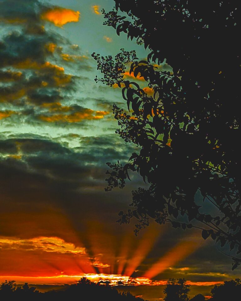 Dramatic sunset rays over the Summerglen Community