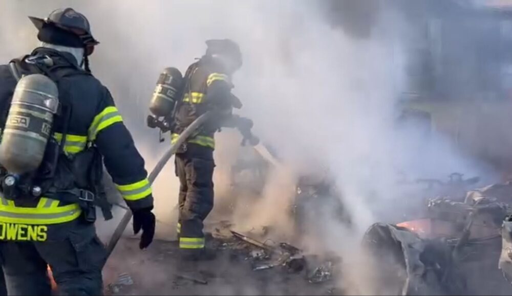 MCFR pickup truck fire spreads to other vehicles and home in SE Ocala on November 29, 2023 firefighters exintinguishing vehicle fire