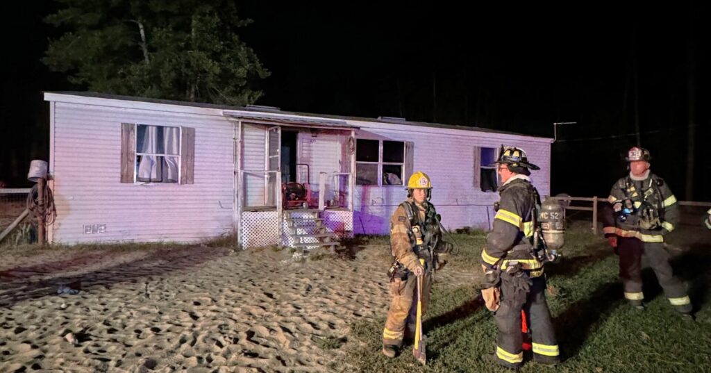 MCFR rescues 4 pets from Ocala mobile home fire on November 2, 2023 firefighters outside home
