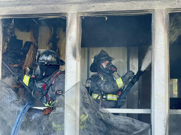 Ocala firefighters extinguishing the porch fire (Photo: Ocala Fire Rescue)