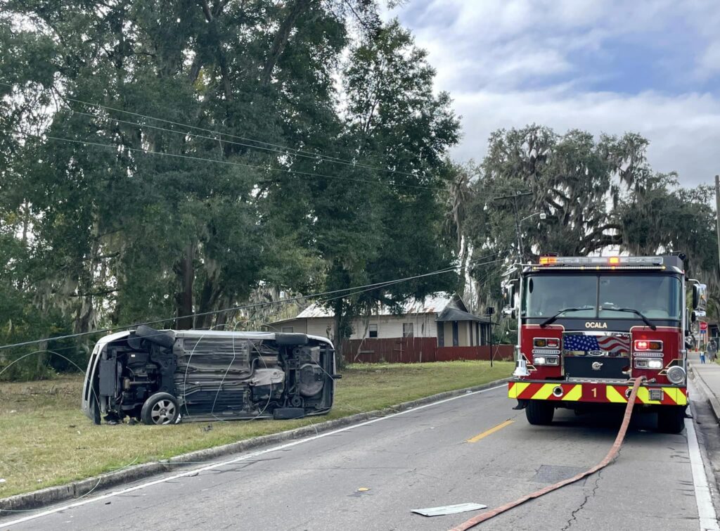 OFR driver ejected after crashing into power pole in Ocala (Dec 13, 2023) fire truck and car on side