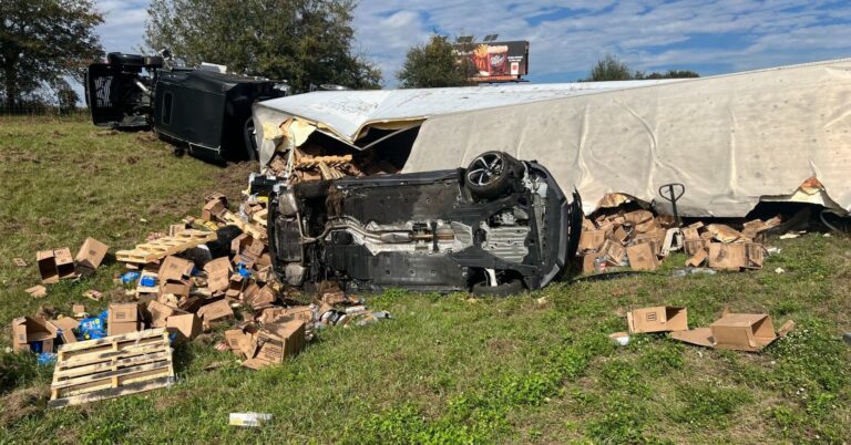 Overturned semi spills antifreeze on I 75 (Dec 5, 2023) photo of semi with boxes scattered (MCFR)