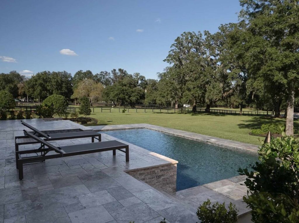 The outdoor space features a heated, saltwater pool. (Photo: Realtor.com)