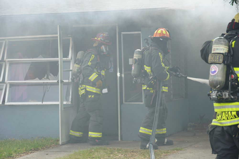 Firefighters battle house fire in SW Ocala on May 7, 2024. 