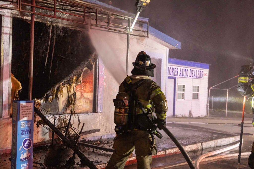 Firefighter fights flames at Marathon Gas Station. Photo Marion County Fire Rescue