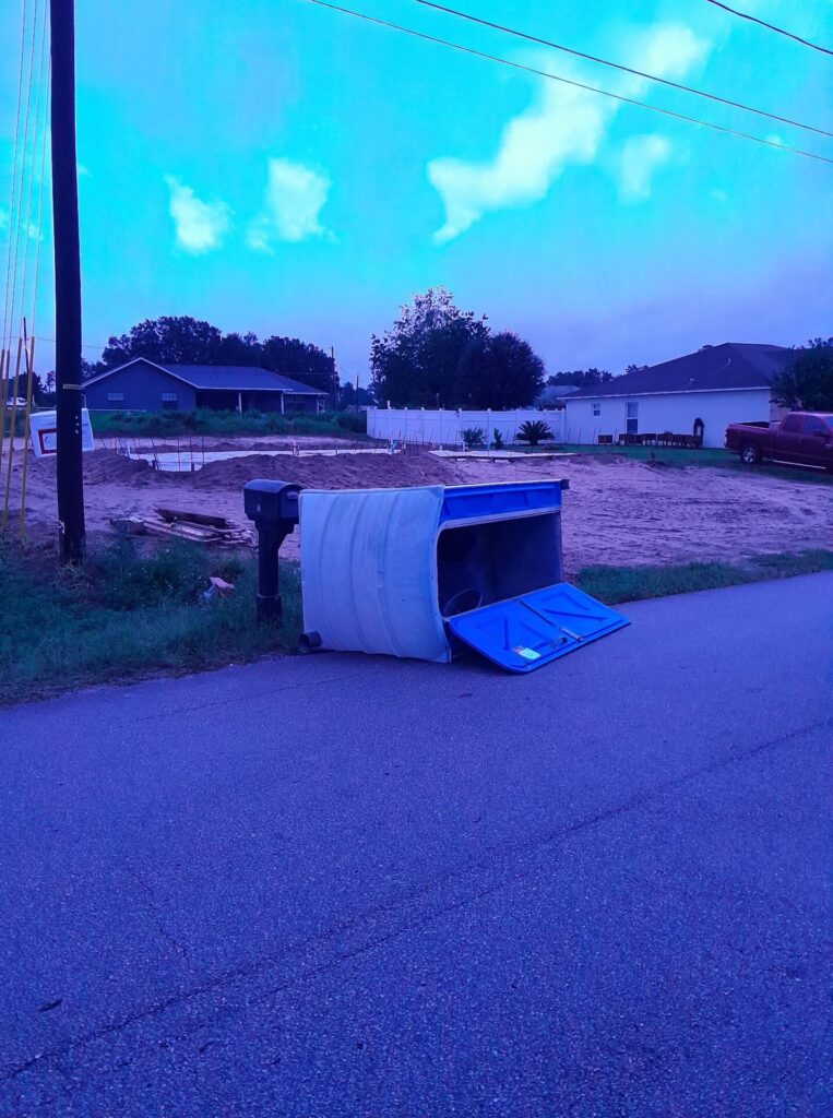 Hurricane Milton Port a potty tilted over Gayle Doyer
