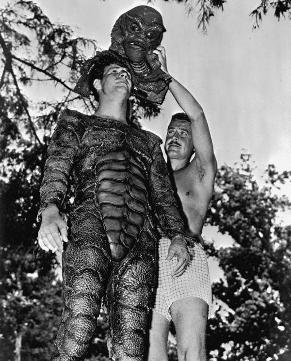 Ricou Brown putting on the creature s head during filming of the Creature from the Black Lagoon