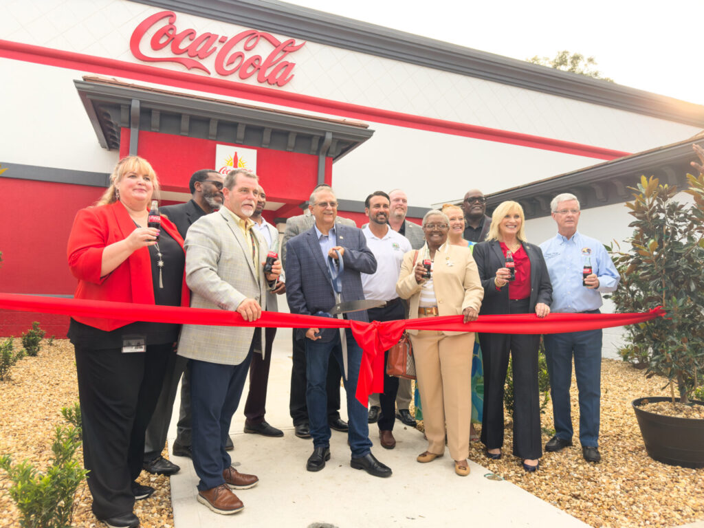 Officials cut the ribbon on the new Coca Cola distribution center in Ocala