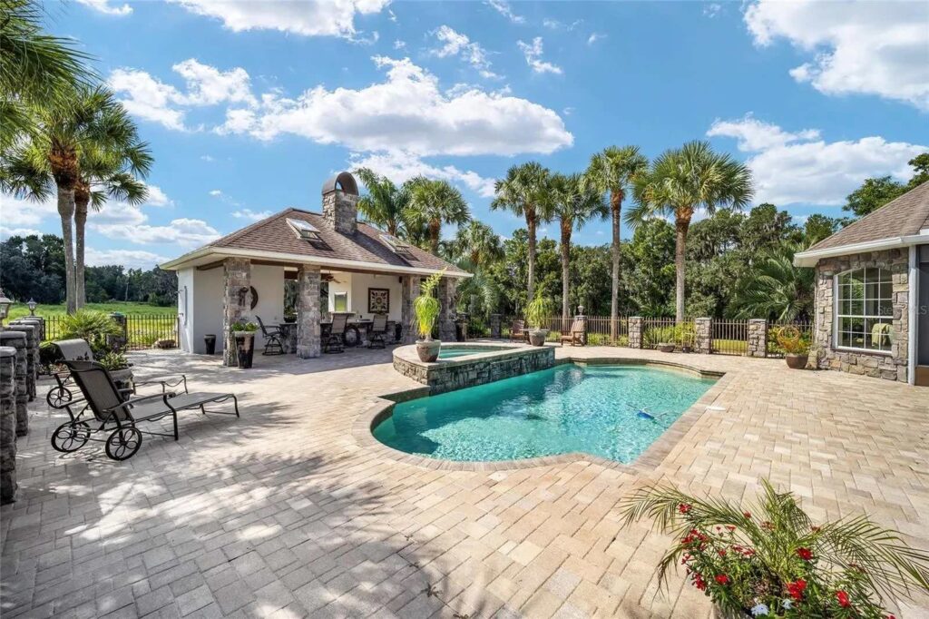 The backyard pool area features several upgrades.