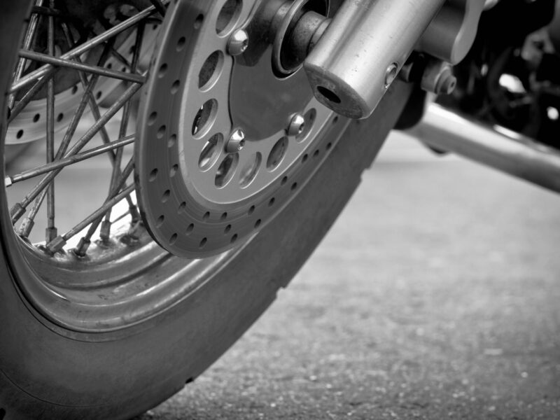 Closeup of motorcycle wheel and spokes