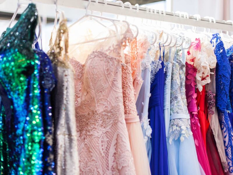 Rack with chic evening dresses.