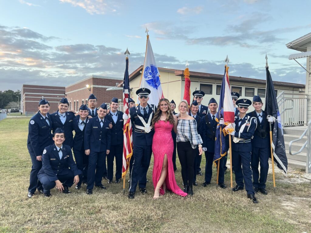 Wing Commander Chloe Kostowicz (center) with her fellow cadets. Kostowicz was crowned Homecoming Queen at Forest High School this school year.