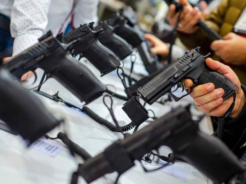 Gun Display Stands. Pistols for sale in the store.