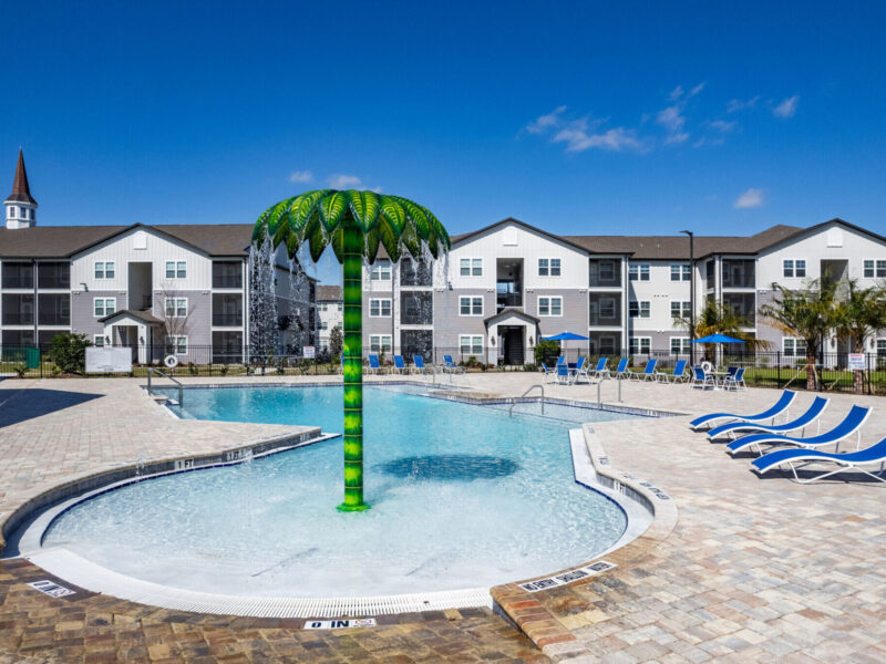 Spires 27 features several amenities, including a large pool.