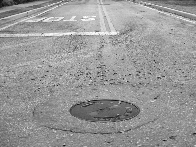 A manhole cover in Ocala. City officials are considering the purchase of 300 new manhole covers and rings.
