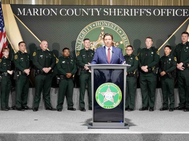 Governor Ron DeSantis awards 12 Marion County Sheriff's Office deputies new recruit bonus checks for $5,000.
