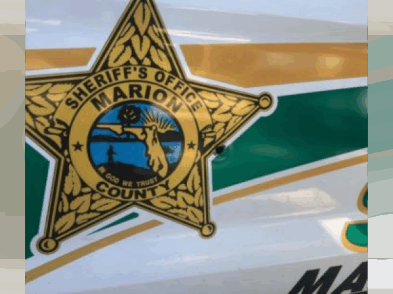 Marion woman accused of threatening to shoot man, dog