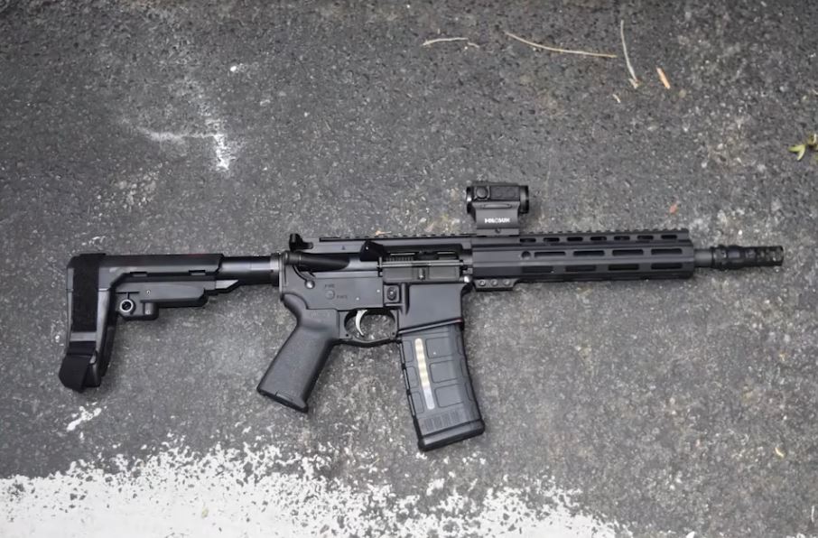 After apprehending Voshon Lasef Brown, OPD officers found this rifle underneath a car that was parked nearby. (Photo: Ocala Police Department) After apprehending Voshon Lasef Brown, OPD officers found this rifle underneath a car that was parked nearby. (Photo: Ocala Police Department)