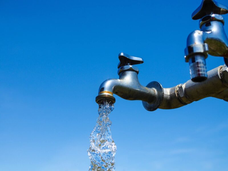 Water coming out of faucet emulating fluoride and fluoridation
