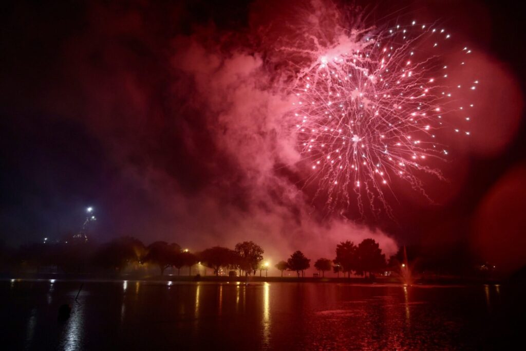 Fireworks were displayed over Tuscawilla Park for this year's event, which was impacted by inclement weather.