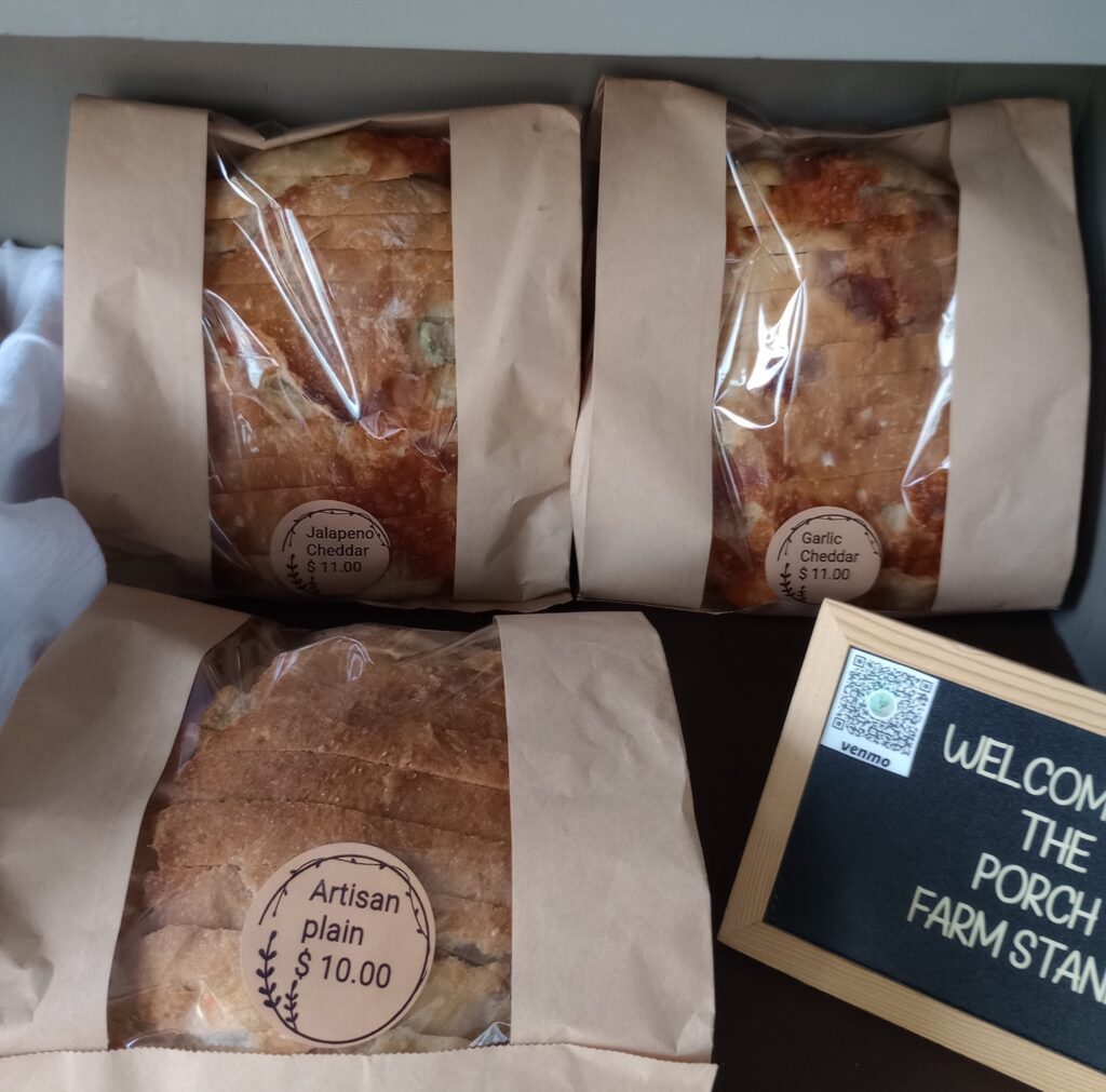 There are several types of bread for sale at the Porch Farmstand in Ocala.