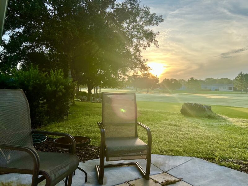 Beautiful sunrise above the trees at On Top of the World in Ocala