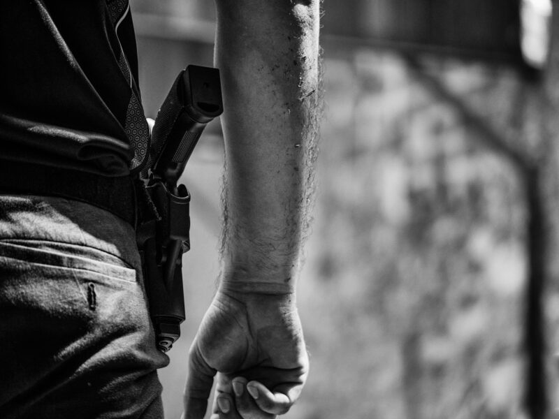 Gun in holster illustrating open carry of firearms in Florida