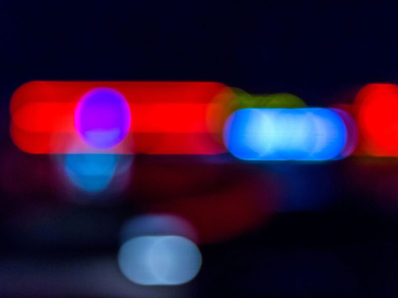 Blurred sirens in night