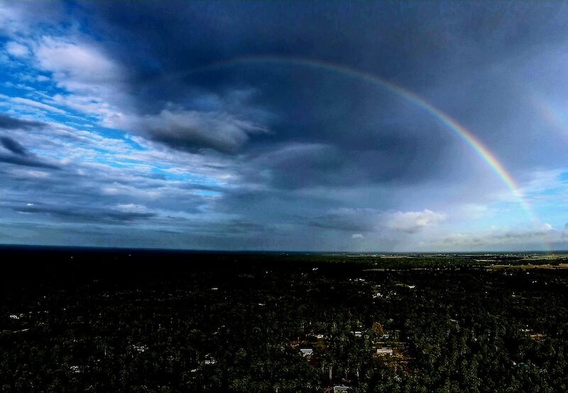 Drone shot of double rainbow over Lake Tropicana in Dunnellon