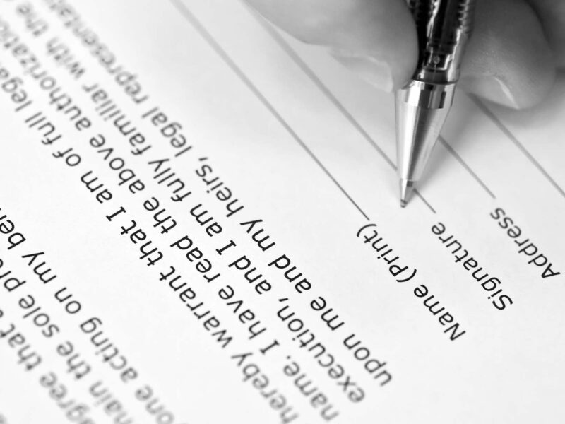 Signature on a petition with a name, address, and city line