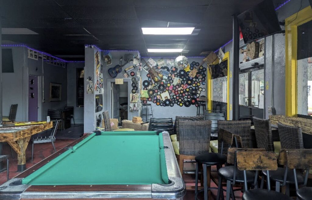 A pool table inside of The Inn Spot
