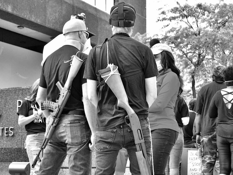 Armed individuals with guns exercising open carry