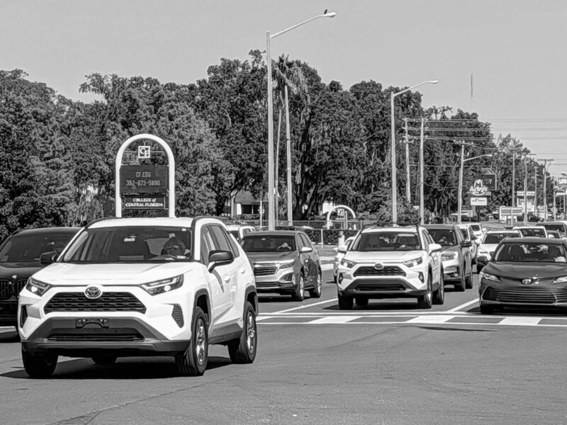 Traffic in Ocala on State Road 200 in October 2025 black and white