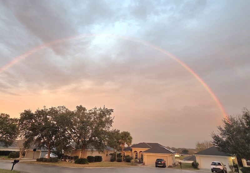 Colorful rainbow over Heath Brook Hills in Ocala