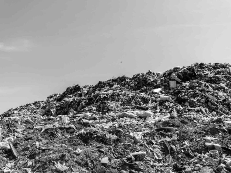 Garbage at pile at landfill