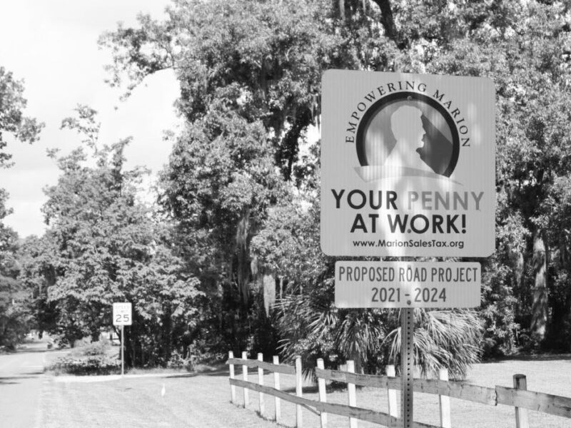 Your Penny At Work sign in Marion County