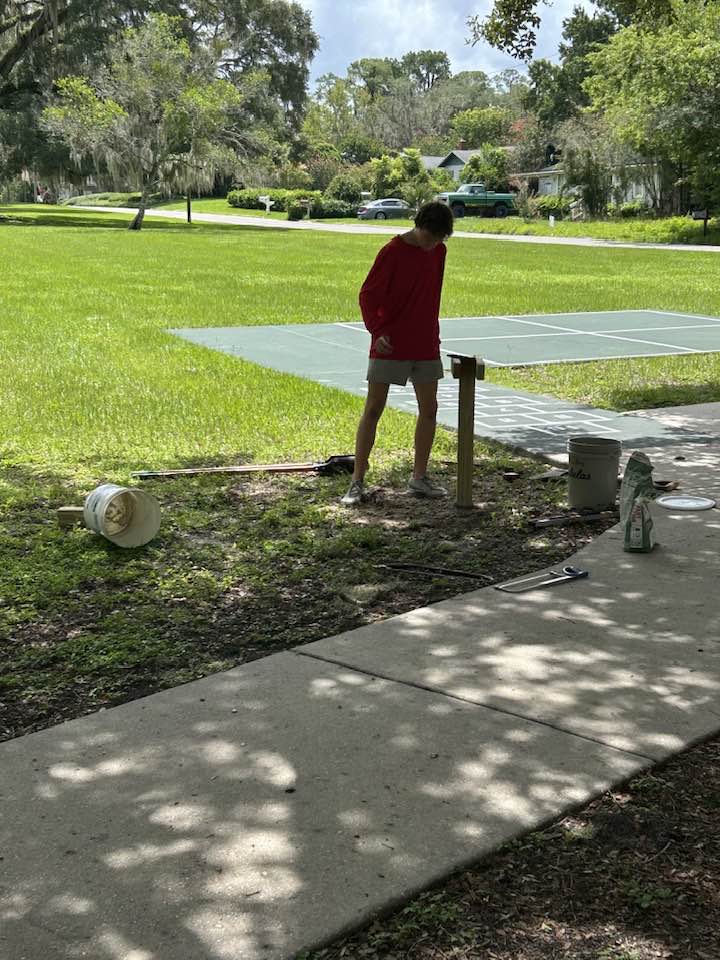 Cash Collins installed the Little Free Library kiosks at three different parks in Ocala.