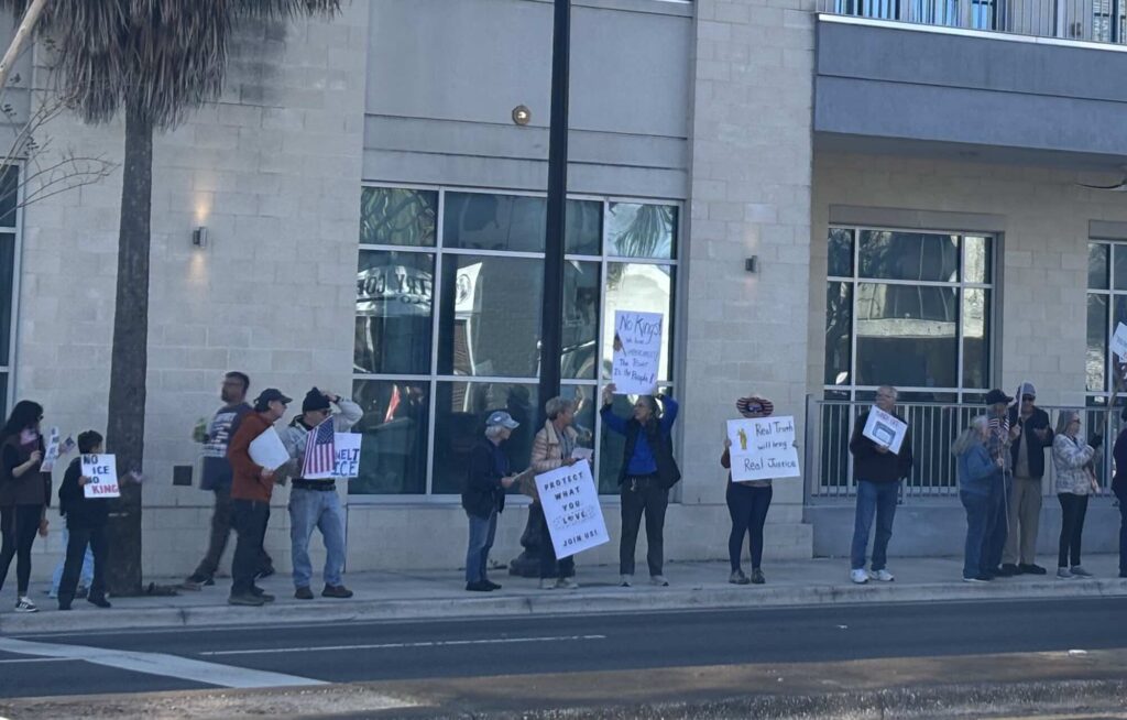 Protestors along E Silver Springs Boulevard on Saturday